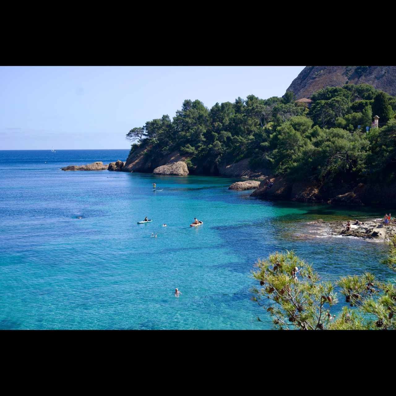 Landscape photo fitted into a square with black bars above and below